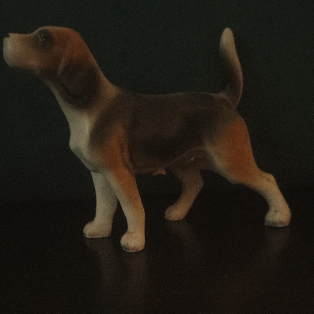 Realistic Brown and White Dog Figurine